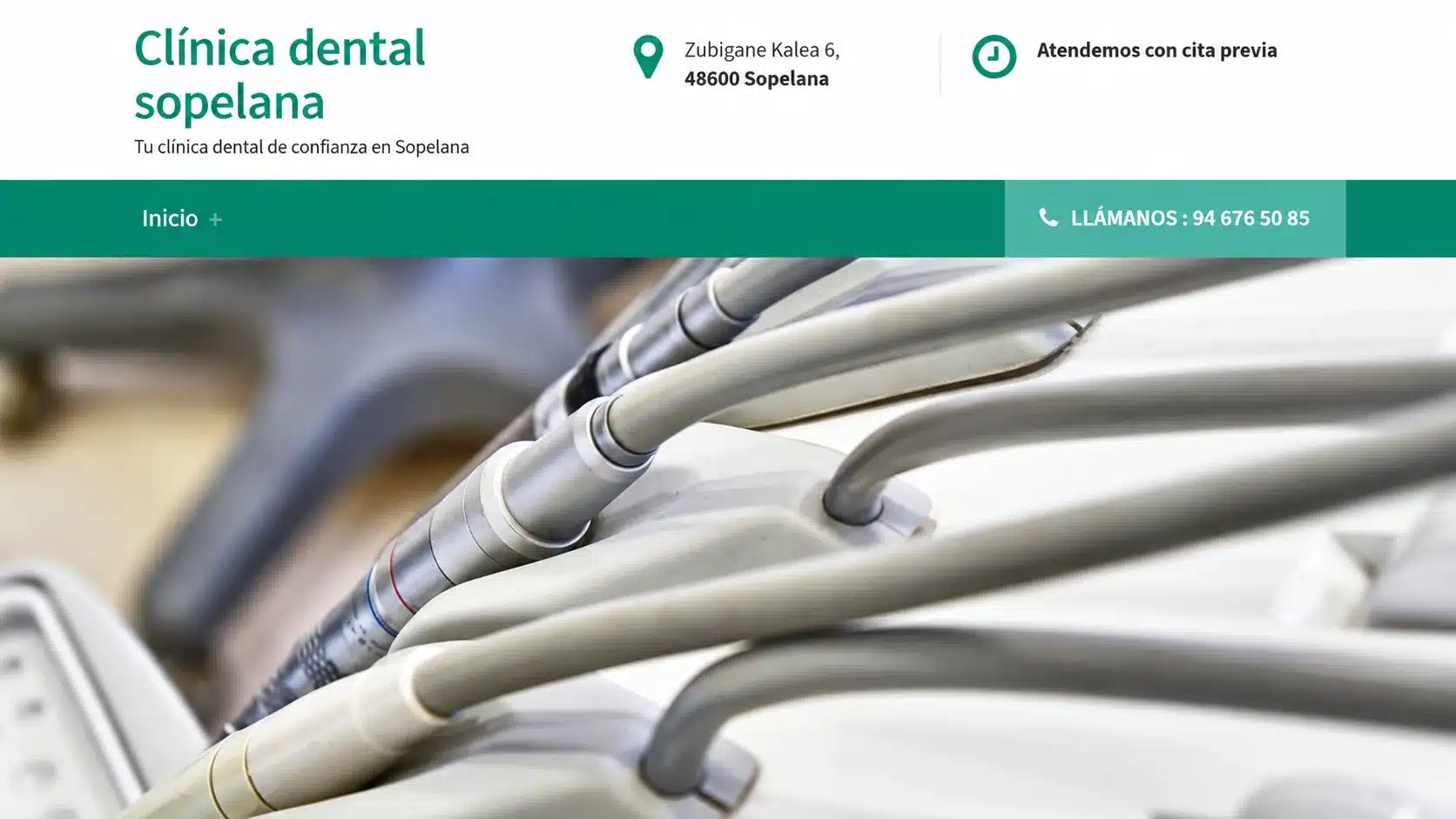 Página web de Clínica Dental Sopelana con imagen principal de consulta dental